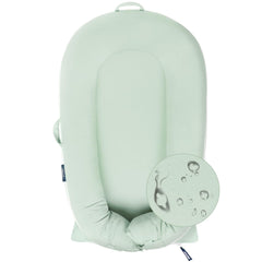 MEXXI organic replacement cover Pistacho Green on a DockATot Deluxe for breathable comfort