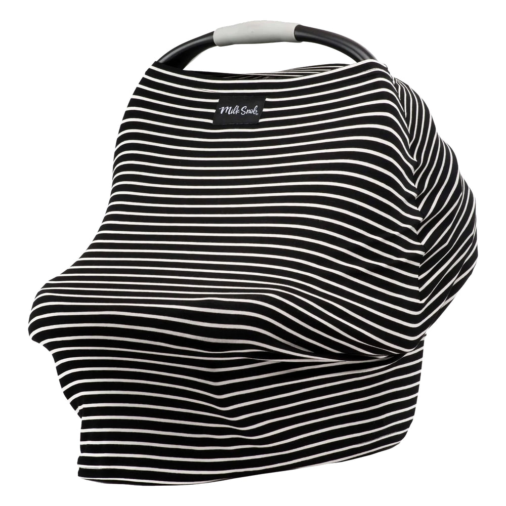 Milk Snob Original 5-in-1 Cover provides breathable privacy during outings.