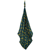 Milkbarn Firefly print swaddle blanket showing its gentle, breathable fabric for cozy baby naps