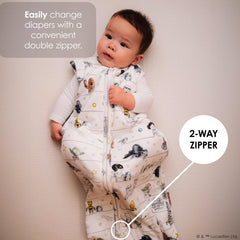Milk Snob wearable blanket on baby illustrates cozy, safe crib-side use.