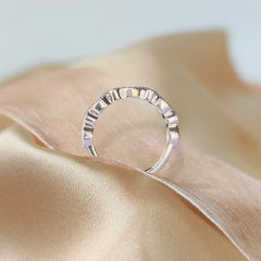 Milky Treasures Band Ring closeup showing four cubic zirconias for subtle sparkle.