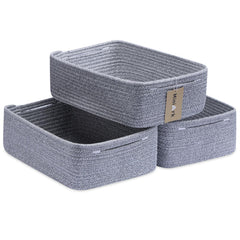 MiniArk large shallow basket in a bathroom holding towels for easy storage.