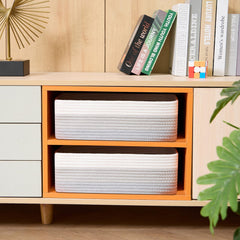 MiniArk shelves with these baskets demonstrate tidy storage for towels and cosmetics.