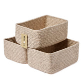 MiniArk small storage baskets front view on a clean surface showing warm woven texture