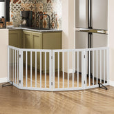 Mino Kesper dog gate fully assembled in use for safe doorway separation and easy pet management.