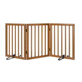 Mino Kesper freestanding pet gate in walnut bamboo blocks stair access with stylish stability.