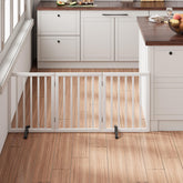 Mino Kesper white wide-pet-gate-assembly provides a sturdy doorway barrier for pets.