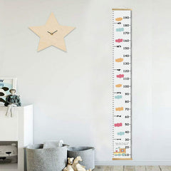 MinoMia dual-scale ruler displays height from 0.2 ft to 6.5 ft.