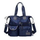 MINTEGRA nylon tote bag front view with organized pockets for daily carry.