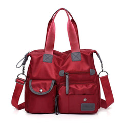 MINTEGRA Nylon Tote Bag front view showing roomy exterior pockets for daily essentials.