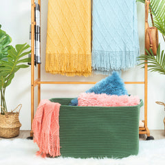 Mintwood Design 22in blanket basket forest green side view with sturdy handles for transport