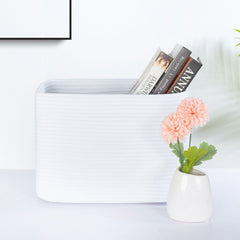 MINTWOOD Design woven storage baskets decorate a display while adding texture.
