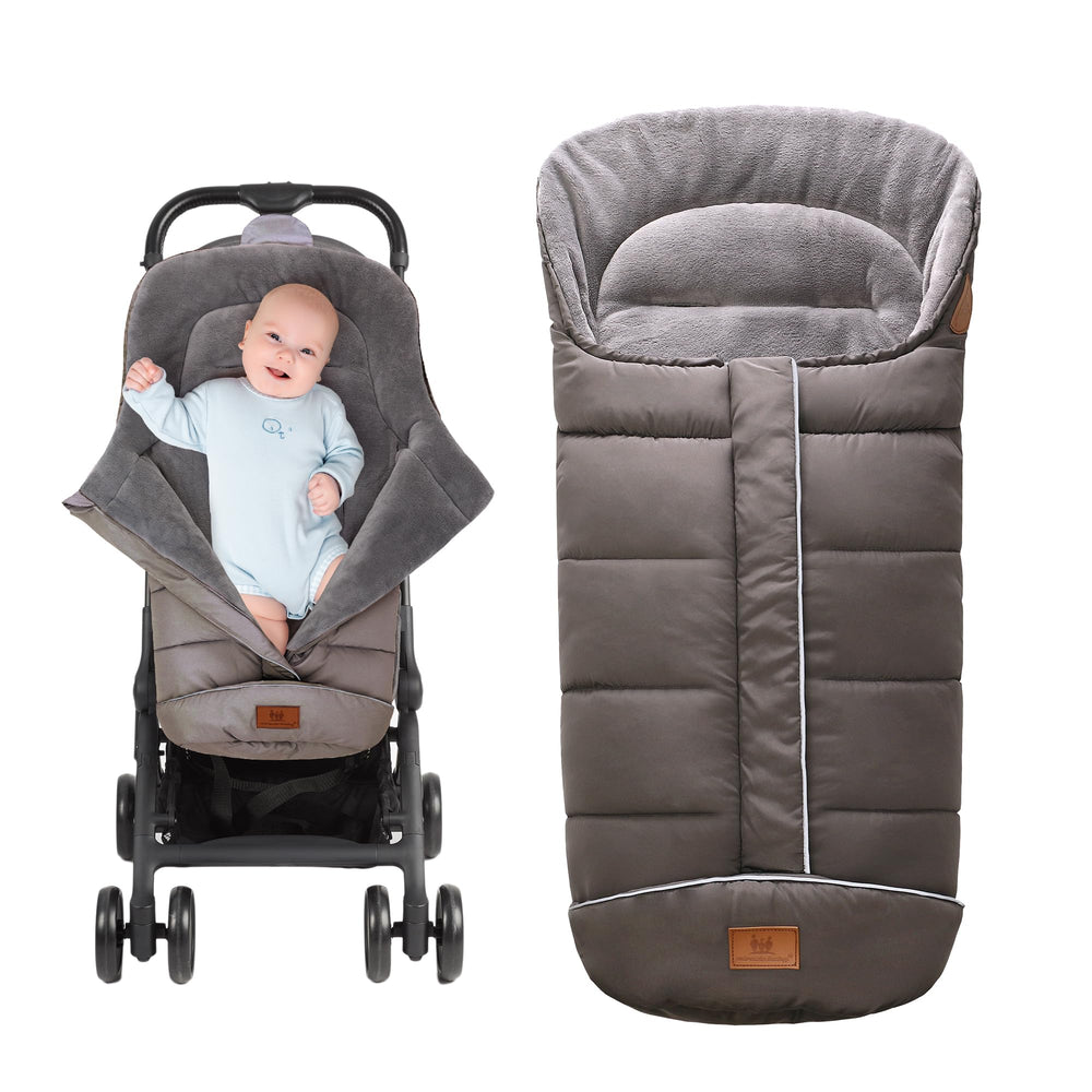 Miracle Baby bunting bag on stroller with windproof shell for chilly rides.