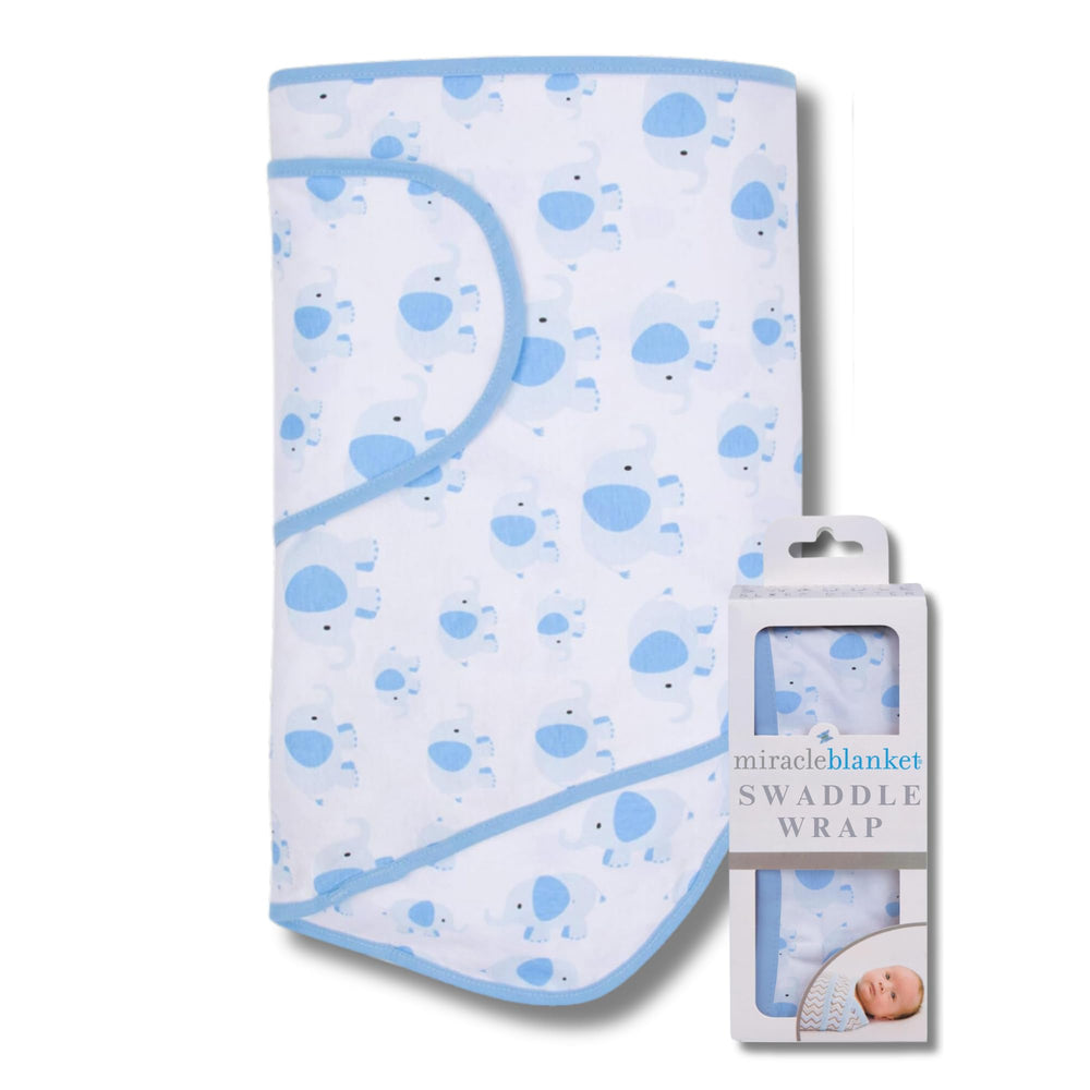Miracle Blanket swaddle Blue Elephants shows secure arm hug for calmer sleep.