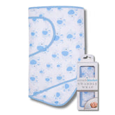 Miracle Blanket swaddle Blue Elephants shows secure arm hug for calmer sleep.