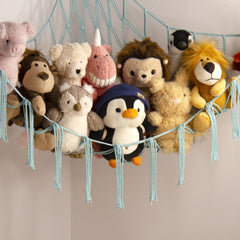 Mirolam stuffed animal hammock hanging corner setup demonstrates space-saving playroom organization.