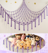 Mirolam stuffed animal storage hammock hanging in nursery corner for clutter-free play space.