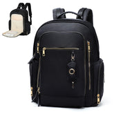 Miss Fong diaper backpack front view highlights unisex design for organized on-the-go parenting.