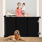 Miumoon retractable baby gate closed on stairs for toddler safety.