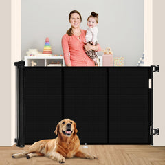 Miumoon retractable baby gate closed on stairs for toddler safety.