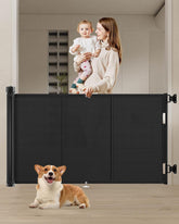 Miumoon retractable baby gate at stairs showing sturdy design for stair safety.
