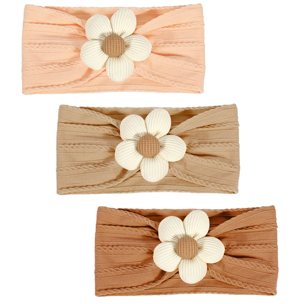 MIUXUESO beige baby flower headbands with soft elasticity for gentle newborn wear.