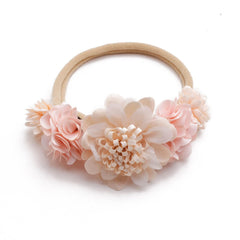 mligril baby headband worn at a photo session enhances cute family memories.