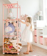 Mloong stuffed animal zoo storage pink-wood vertical view shows organized plush toys for easy playtime