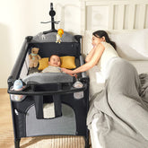 MMBABY 5-in-1 pack and play crib setup showing compact frame for travel-friendly sleep