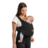 Moby Baby Duet Carrier worn by parent for hands-free comfort.