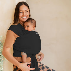 Moby Basics wrap worn in hip carry supports hands-free errands.