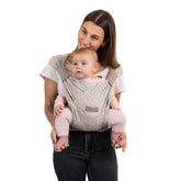 Moby Prairie Blooms Duet Carrier worn forward-facing for curious baby exploration.