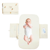 MODAKIDS portable diaper changing pad folded for travel convenience.