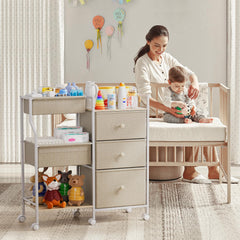 Modanais off-white nursery cart on wheels easy to move between changing table and crib.