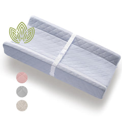 Modera changing pad mattress closeup shows plush cushion for gentle diaper changes.