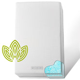Modera dual-sided crib mattress with a firm infant side for safe sleep.