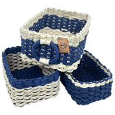 Modern Granny color blocks small wicker baskets weave closeup highlighting handwoven texture and eco-friendly fibers.