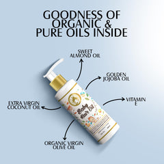 Mom & World Baby Hair Oil application massage on scalp.