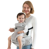 Momcozy baby carrier hip-seat setup shows hands-free stability for errands.