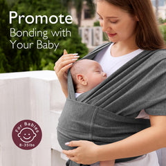 Momcozy baby securely seated in wrap highlights ergonomic support during everyday activities.