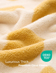 Momcozy coral-fleece close-up highlighting plush softness for baby's skin