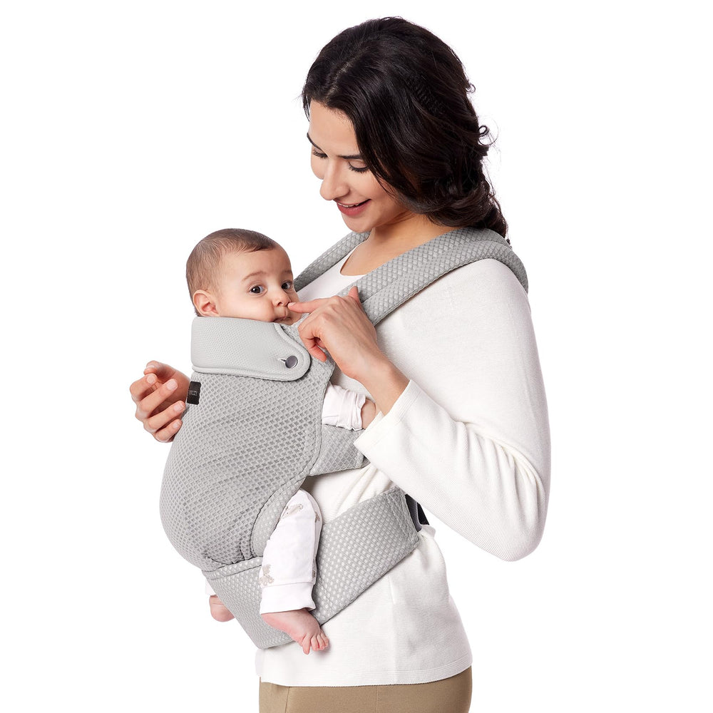 Momcozy breathable mesh baby carrier with air mesh panel for all-day cooling.