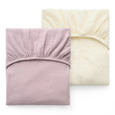 Momcozy muslin crib sheet 2-pack offers soft cotton comfort for gentle baby sleep.