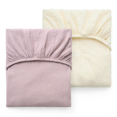 Momcozy muslin crib sheet 2-pack offers soft cotton comfort for gentle baby sleep.