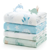 Momcozy muslin swaddle blanket highlights silky texture for gentle baby skin comfort.