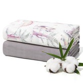 Momcozy muslin swaddle silky-texture for gentle newborn comfort.