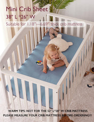 Momcozy Pack N Play mattress cover—breathable design for safe sleep.