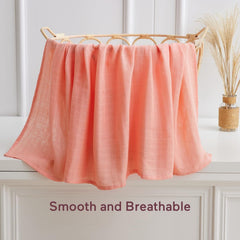 Momcozy swaddle baby wrapped securely for calm sleep.