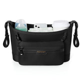 Momcozy universal stroller organizer attached to a stroller for quick-access essentials
