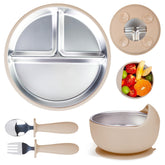 Momera stainless steel baby plate with suction base staying put on a flat table.